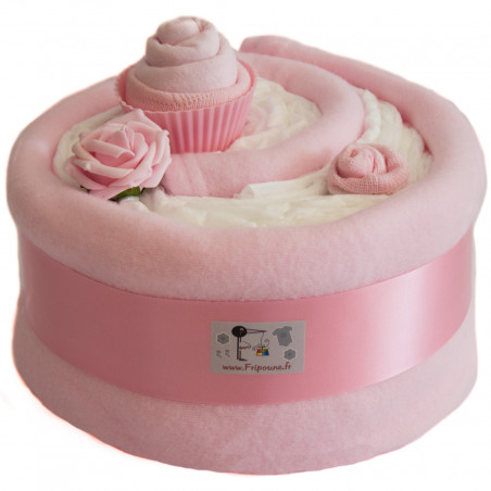 Gâteau de couches et couverture rose